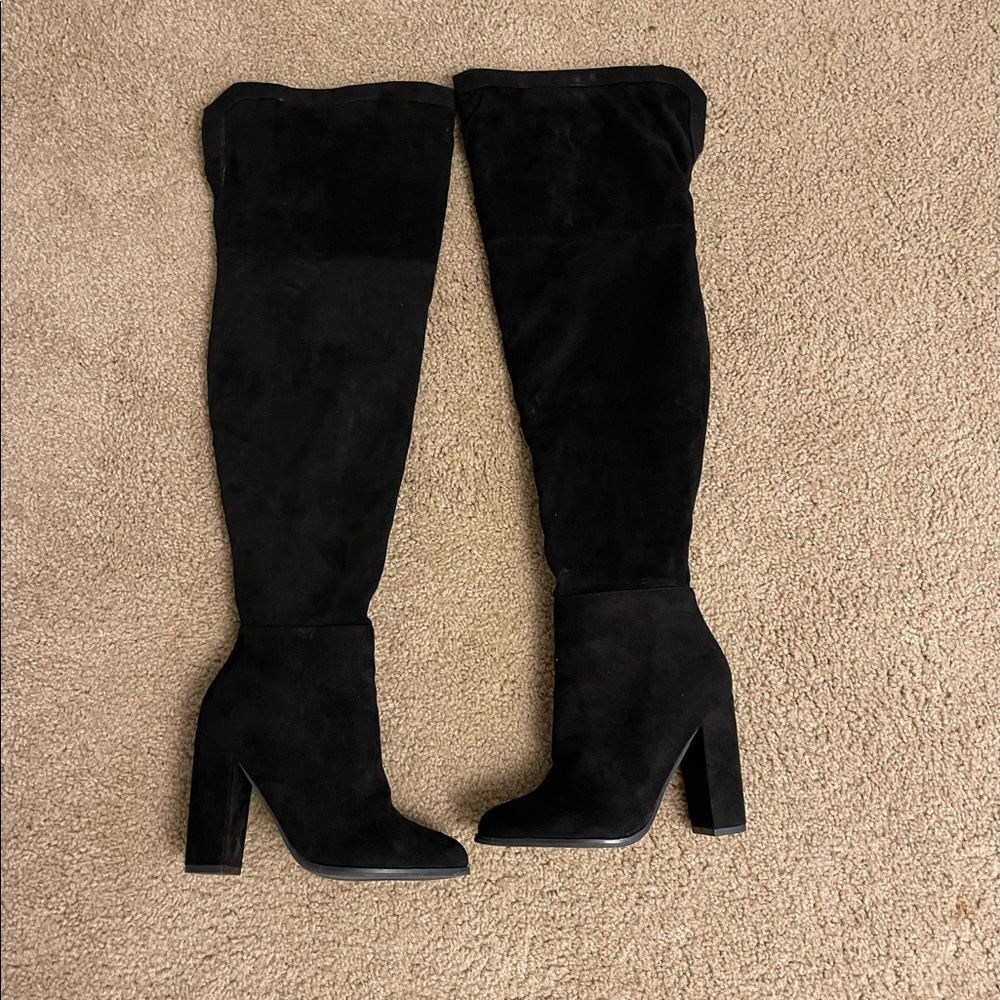 Black knee high boots, thick heel. Size 7